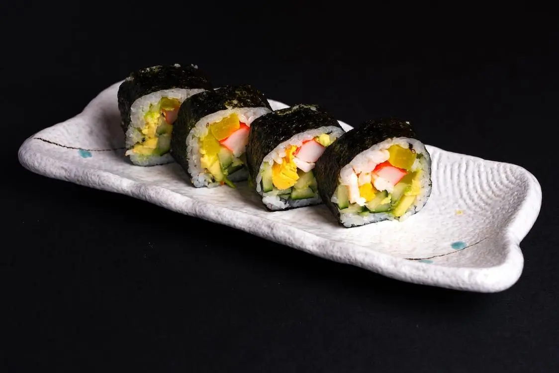 Vegetable Maki Roll is a sushi roll with assorted vegetables inside nori at Sushi Town, a Japanese restaurant in San Jose
